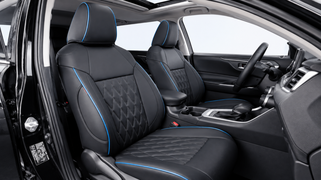 Toyota RAV4 interior with black seats and blue accent stitching