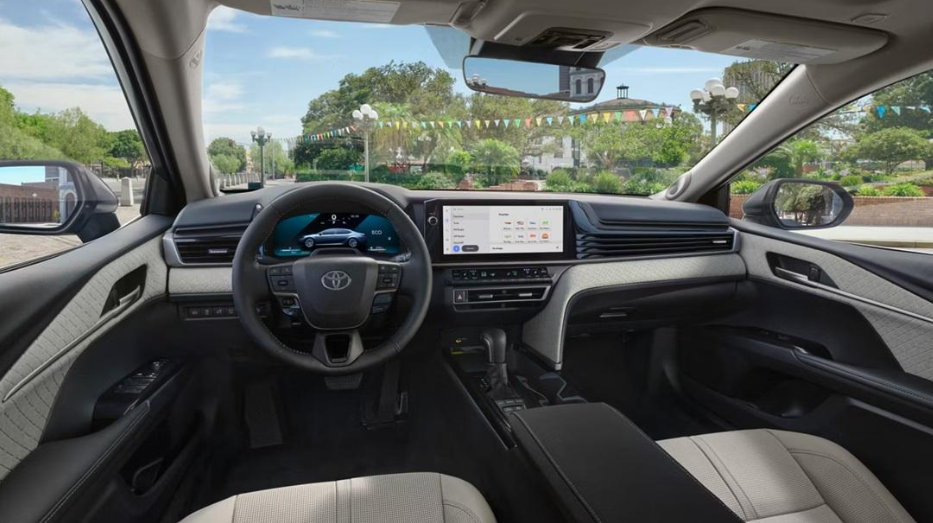 Toyota Camry interior with modern dashboard, touchscreen, and comfortable seating